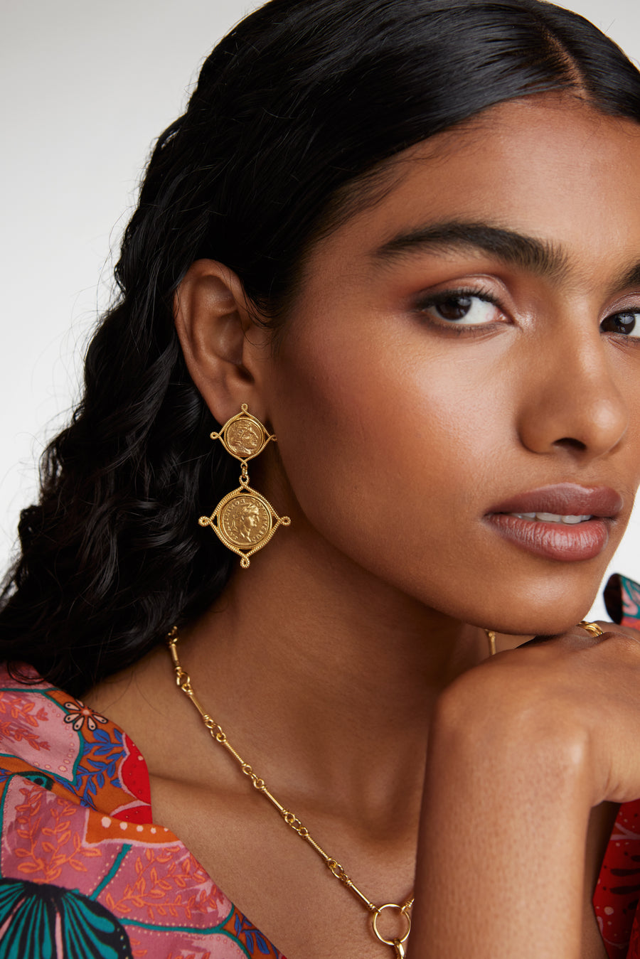 model image wearing soru jewellery double coin earrings with a charm chain necklace