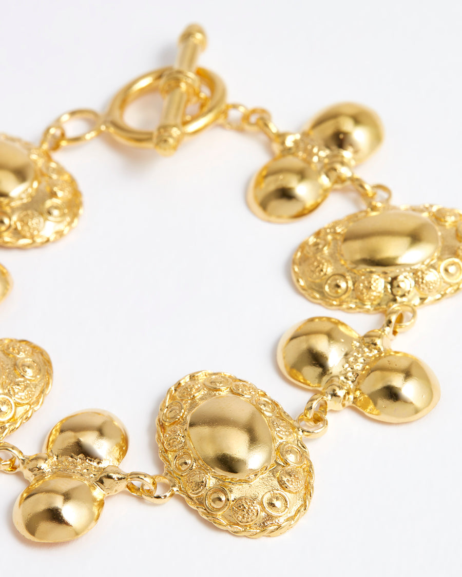 Close up detail image of the gold bracelet from the daphne oz X soru collection 