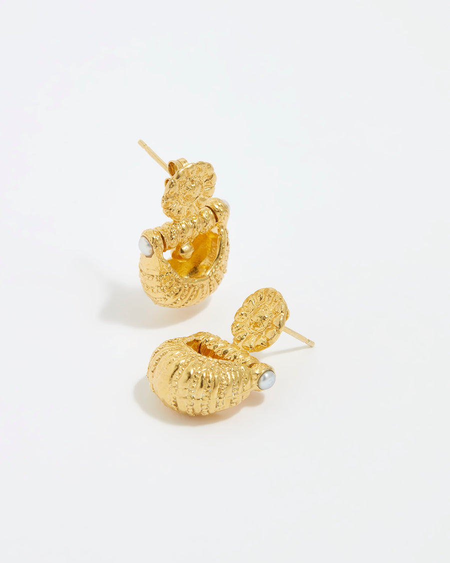 Image of gold plated small croissant shaped earrings by Soru Jewellery and Daphne Oz