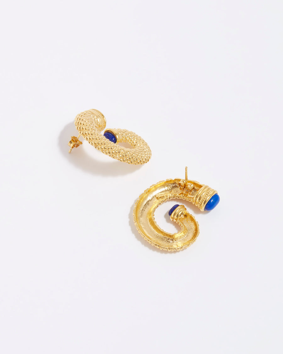 product shot of yellow gold plated oversized stud earring with twisted gold and blue ends