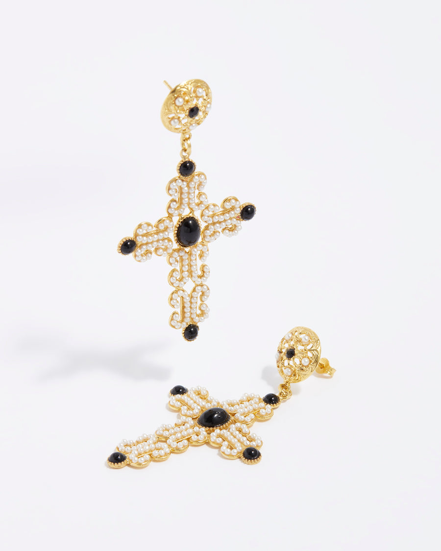 product shot of intricate cross earrings with mini pearls and black onyx beads