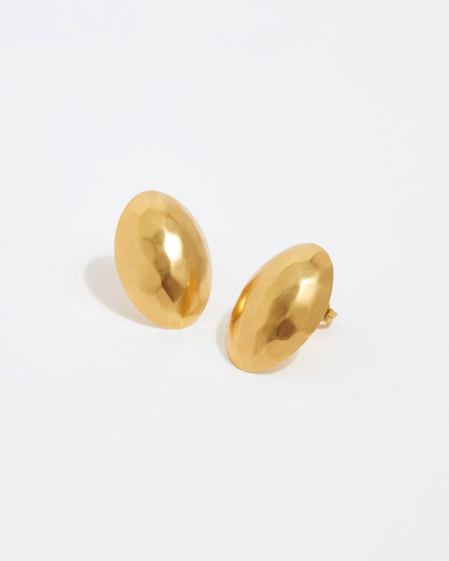 Close up image shot of Soru Jewellery small oval textured gold stud earrings on a white background 