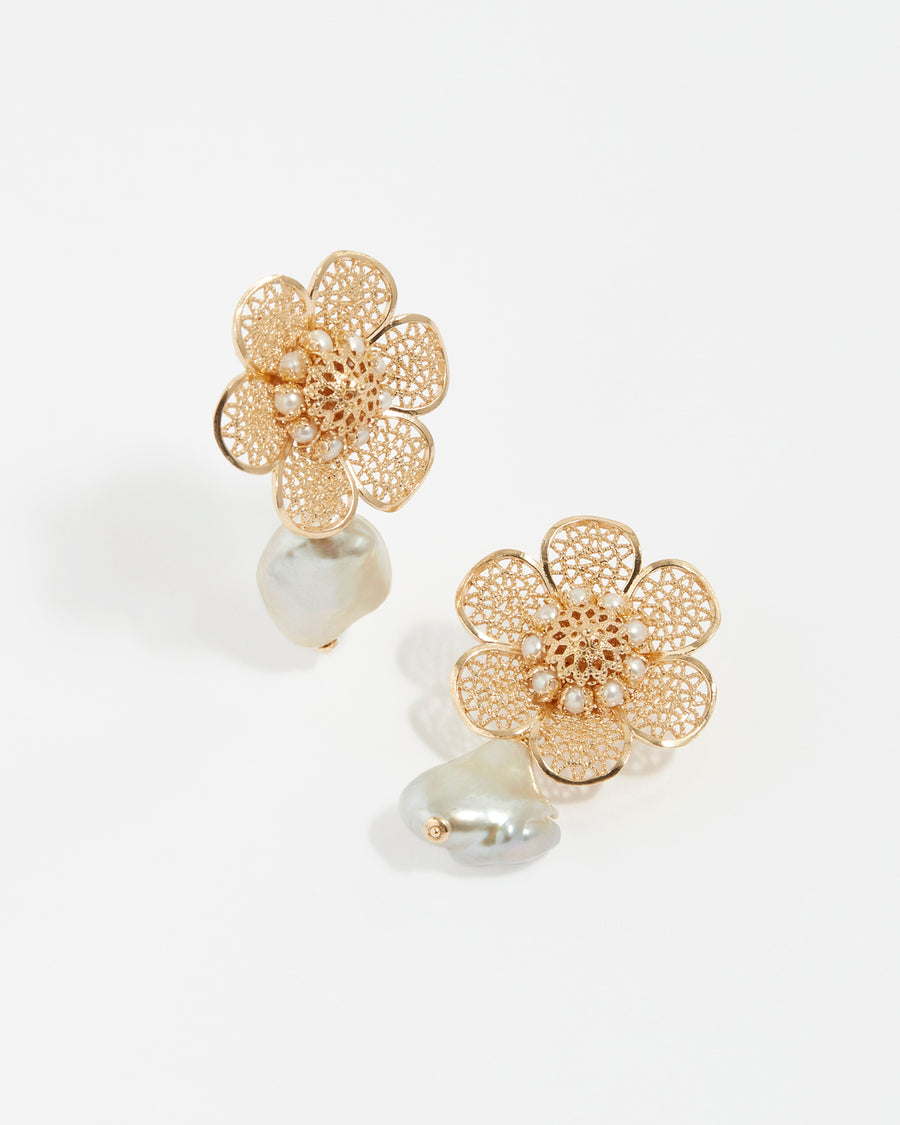 soru large flower stud earrings with a single baroque pearl hanging made in 24ct gold plated silver